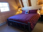 Mid level bedroom with two queen beds